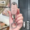 Para Dongfeng Nissan Sylphy Juego de Llaves Teana Nissan Qashqai Qijun Tiida Loulan Bolsa de Protección para Hombres y Mujeres Hebilla