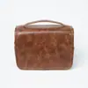 2025 Nova Bolsa de Higiene Pessoal Masculina em Couro PU Mais Vendida Portátil de Viagem Bolsa de Armazenamento para Artigos de Barbear