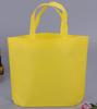 Bolsas de costura al por mayor no tejidas, bolsas de tela lisa en stock, LOGO impreso en película, promocionales para llevar, portátiles, bolsas publicitarias