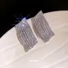 Nuevos aretes de plata con pasador y borlas de diamante, aretes simples y elegantes para el día a día, lujo ligero con un toque de alta gama, aretes versátiles para mujer