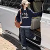 Nueva sudadera de otoño para niñas mayores, ropa infantil, sudadera con capucha casual de letras para primavera y otoño, versátil y disponible para venta al por mayor