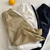 Pantalones para Niños 2026 Ojos Bizcos Verano Nuevas Llegadas Niños y Niñas Cinta Tejida con Letras Pantalones Largos Bebé Sueltos Pierna Recta Pantalones Modernos