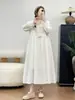 Producto nuevo de otoño vintage estilo japonés: vestido largo de manga larga con cordones, corte holgado, color liso, versátil, casual, vestido largo al por mayor