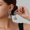Nuevos aretes largos con borlas de la etnia Miao, estilo étnico con lazo de lujo ligero, aretes llamativos exagerados y de moda
