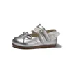 Zapatos para niños en un estilo dulce con moños, zapatos Mary Jane de cuero plateados para niñas, zapatos planos bajos de encaje de princesa con suelas suaves