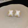 Pendientes Redondos Trapezoidales Geométricos de Aguja Plateada Letra X Pendientes Metálicos Simples Europeos y Americanos Pendientes de Nicho de Alta Gama para Mujer