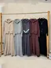 Nuevo Conjunto de Dos Piezas para Mujer Otoño/Invierno 2026: Cárdigan de Punto con Cuello Solapa y Doble Cremallera + Falda de Cintura Alta Estilo Casual