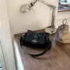 Bolso cruzado para axila de mujer 2026 Nuevo de moda Primavera Pequeño de nicho Plateado Bolso de un solo hombro Alto nivel Viaje Bolso cruzado