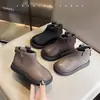 Botas de cuero de moda para niñas 2026 otoño e invierno nuevas botas cortas retro para niños suela blanda versátiles de caña baja botas de motorista Martin