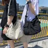 Bolsa de Lona Nueva Estilo Coreano Bolso de Hombro para Pareja Moda Tendencia Ropa de Trabajo Viaje al Aire Libre Bolso Cruzado Bolsa de Lona Venta al por Mayor