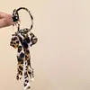 Brincos de Argola Grandes com Fita de Leopardo Exagerada Europeus e Americanos Outono Novo Tecido Selvagem Moderno Alça Longa para Mulheres