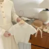 Conjunto de Saia Plissada de Manga Curta com Gola para Meninas Verão Bebê Estilo Coreano Top Suave Estilo Academia Saia Curta Conjunto de Duas Peças