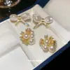 Pendientes de Flor de Zirconia y Perla con Aguja de Plata Electrochapada en Oro Real Pendientes de Nicho de Alta Gama Temperamento Elegante Pendientes Versátiles para Mujeres