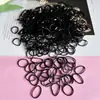 Venta Caliente Transfronteriza Bolsas de Cuerdas de Plástico Desechables, Bandas Elásticas de Goma Negras, Ligas para el Cabello al por Mayor, Bandas para el Cabello para Atar el Cabello