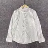 Camisa de manga larga con protección solar para hombre, chaqueta de verano a rayas finas de moda, holgada y con caída, estilo coreano, textura versátil