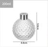 Botella de aromaterapia de erizo botella de vidrio transparente esférica botella de fragancia de ratán adornos botella de perfume con airbag fabricantes mayoreo