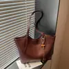 Bolsa feminina vintage de grande capacidade transfronteiriça, nova bolsa de ombro versátil e simples do outono de 2026, bolsa tote de alta qualidade