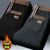 Pantalones de pana forrados de forro polar para hombre de invierno, marca de moda, corte holgado, pierna recta ancha, pantalones deportivos casuales con cordón para hombre