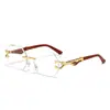 2025 Nuevo Llegado Transfronterizo Europeo y Americano Gafas de Sol Multilaterales sin Marco para Hombre Patas con Textura de Madera Moda Gafas de Sol Decorativas con Cabeza de Leopardo Tendencia