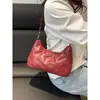 Moda de Primavera Nueva 2025 Bolso de Gran Capacidad para Mujer Tela de Plumón Color Sólido Estilo Simple y Occidental Bolso de Hombro Único