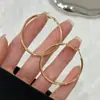 Estilo Francés Estilo Ins Perezoso Pendientes de Aro con Bucle Pendientes Pendientes Aguja de Plata S925 Pendientes de Aro con Sentido Avanzado para Mujer