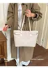 Bolso tote tejido transfronterizo, gran capacidad, color liso, textura de alta calidad, bolso de mano vintage para el día a día, bolso de hombro o axila moderno y a la moda