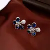 Aretes de Plata Chapada en Oro Real con Flor de Circonita Pulsera Anillo Set de Moda de Gama Alta Joyería de Diseño de Nicho