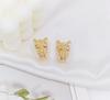 AB Estilo retro europeo y americano chapado en oro diseñador genio cabeza de leopardo con incrustaciones de diamantes personalidad feroz exquisitos aretes de anillo