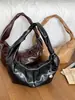 Bolsa de Mão Feminina Nova de Outono 2026 Estilo Vintage Nicho Bolsa de Ombro Transversal Bolsa de Bolinho Elegante de Alta Qualidade