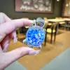 Llavero de Tortuga Luminosa Rellena de Aceite con Tortuga de Cristal Colgante de Arena Movediza Encanto de Regalo Pequeño Decoración para Bolso de Pareja Regalo