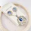 Nuevo especial transfronterizo explosión de tendencia europea y americana titanio acero alta calidad color collar pendientes traje femenino joyería de concha real