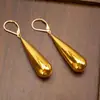 Brincos simples em forma de gota para mulheres, feitos de prata pura, estilo longo, modernos e versáteis, disponíveis em dourado e prata