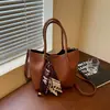 Bolso versátil de moda para mujer, nuevo para el otoño de 2026, de gran capacidad, simple y práctico, para el trabajo