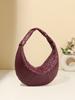 Al por mayor transfronterizo Bolso tejido nuevo Croissant Simple Lujo ligero Nicho Europeo y Americano Bowling Textura de hombro Bolso de axila