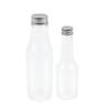 Suministro directo de fábrica botella transparente de PET para dulces botella de plástico para leche botella para bebidas y jugos botella de grado alimenticio para vino de frutas