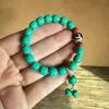 Pulseira de turquesa círculo único pulseira de turquesa sintética artificial estilo étnico tibetano estilo antigo joia de mão atacado