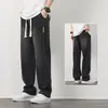 Venta al por mayor de fábrica transfronteriza de jeans para hombre, moda de primavera y otoño estilo callejero americano de alta gama, pantalones largos casuales rectos holgados de pierna ancha