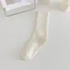 Meias femininas de cano médio, meias de algodão de cor sólida, absorventes de suor, estilo japonês, alta elasticidade, meias longas empilhadas femininas casuais da moda