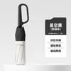 Paraguas creativo con hebilla de anillo de apertura manual al 70% de descuento, protección solar, doble uso para lluvia y sol, paraguas de negocio con recubrimiento negro, sombrilla de estilo japonés simple al por mayor