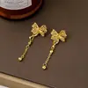 Pendientes de Oro de Arena Vietnamita Estilo Chino Pendientes de Borla de Lazo Hueco de Lujo Diseño Joyería de Larga Duración Fabricante