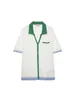 Comercio Exterior Transfronterizo Verano 2026 Nuevo Estilo Europeo y Americano Manga Corta Cuello Camisero Calado Tejido Top + Conjunto de Shorts Casual Versátil