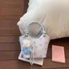 Bolsas Estampadas Tendência de Nicho Primavera e Verão para Mulheres 2026 Nova Bolsa Transversal Versátil Bolsa de Mão Exquisita Bolsa Saco
