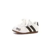 Zapatillas de moda para niñas 2026 otoño e invierno nuevo estilo zapatillas versátiles con lazo para niños zapatillas elegantes con suela blanda zapatillas de entrenamiento alemanas