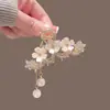 Pinza de tiburón de tamaño mediano, de alta gama, accesorio para el cabello, pinza para el cabello de tamaño grande, de alta gama, diseño de flor de camelia, pinza de garra exquisita para mujer, estilo de verano