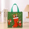 Venta directa de fábrica: Bolsas de tela no tejida navideñas, bolsas de regalo festivas y bolsas para dulces de Halloween
