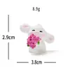Micro-paisaje creativo lindo brisa de primavera conejito blanco figura decoración DIY accesorio de caja sorpresa adorno de escritorio