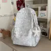 Mochila Estrellada Azul Hielo Nebuloso y Blanco Leche Estilo Coreano Fresca y Energética para Niñas y Estudiantes para Salidas de Fin de Semana y Compras
