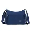Bolso bandolera moderno y sencillo para mujer, bolso ligero de tela de nailon resistente al agua para ir al trabajo, salidas casuales y viajes.