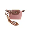 Mini Bolsas Pequeñas Transfronterizas para Mujer 2025 Nuevo Modelo Bolsa para Labial Auriculares Bolsa Tipo Dumpling Estilo Coreano Cartera Personalizada Al por Mayor