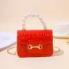 2026 Bolso de Hombro Transfronterizo Directo de Fábrica, Bolso de Mano con Adorno de Perlas, Bolso de Gelatina con Textura de Piedra, Perfecto como Regalo